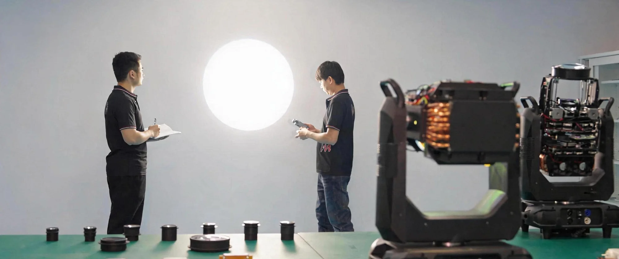 Hengmei staff evaluating a light output in the lab